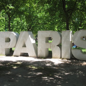 Giant letters in a park that spell paris