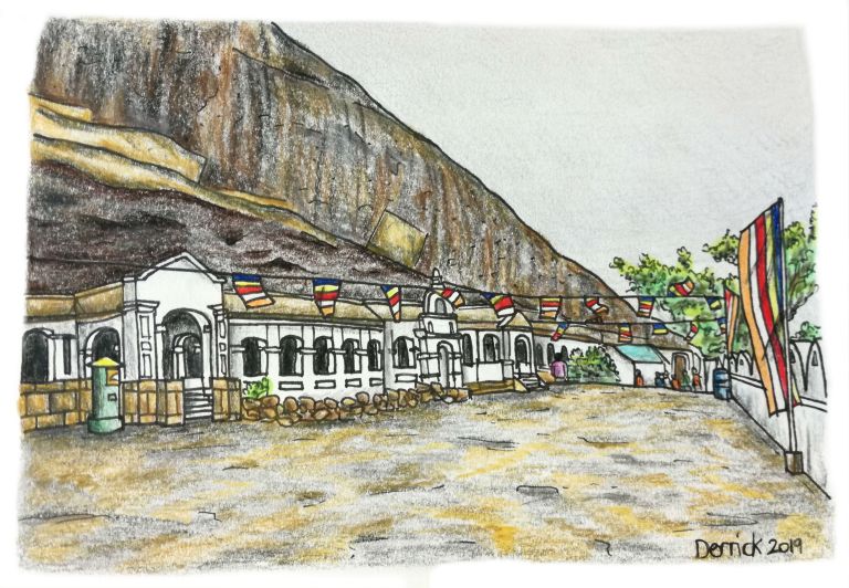 Rock face and entrance to Dambulla caves in sri lanka